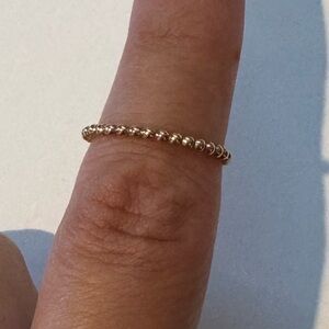 Dainty gold tone beaded ring